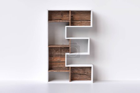 Foto de Letra de madera 3D E en forma de muebles, diseñada para mostrar libros o pequeños artículos decorativos. Alta calidad y representación 3D detallada. - Imagen libre de derechos