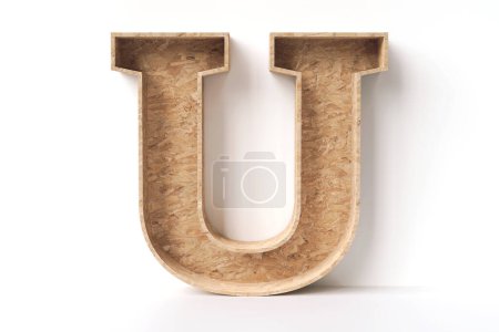 Téléchargez les photos : Panneau de brin orienté bois en forme de lettre U agréable à afficher des produits ou des objets respectueux de l'environnement. rendu 3D de haute qualité. - en image libre de droit