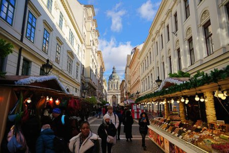 Photo for Budapest, Hungary - November 18, 2023: Christmas market pavilions near St. Stephen's Basilica. - Royalty Free Image