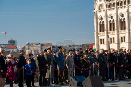 Budapest, Hungary - March 15, 2024: National day celebration near the parliament building. Military parade with military band.