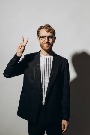 Photo for Young man in black jacket with party glasses on color background. - Royalty Free Image