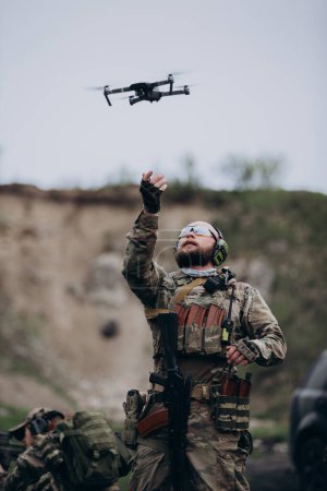 Photo for Portrait of Ukrainian military using a drone - Royalty Free Image