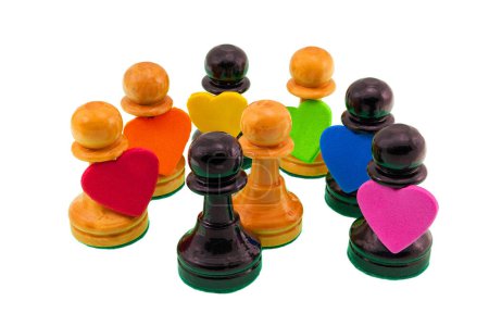 Black and white chess pawns carrying hearts with the LGBT colors.