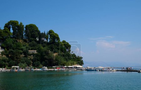 Photo for Monastery on the water, over which planes take off and land Greece Corfu island Vlacherna Monastery - Royalty Free Image