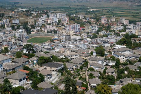 Girokastra is a city in southern Albania, in valley of Drinos River. Administrative center of region and municipality. Mediterranean climate. Cityscape with those famous aligned white facades.