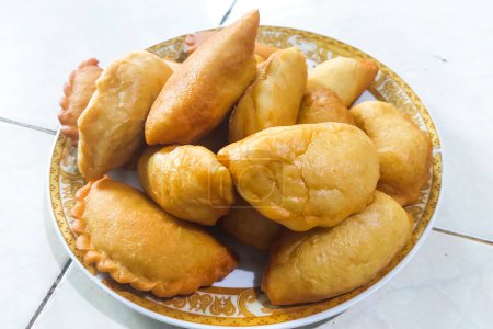 Panada and Jalankote are served on a plate ready to eat
