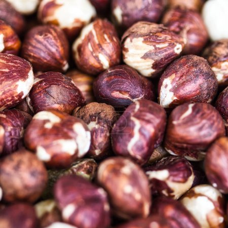 Photo for Multiple hazelnuts in a store: macro photography from top - Royalty Free Image