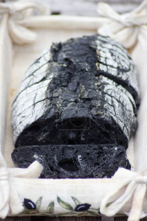 Photo for Charcoal bread in the oven - Royalty Free Image