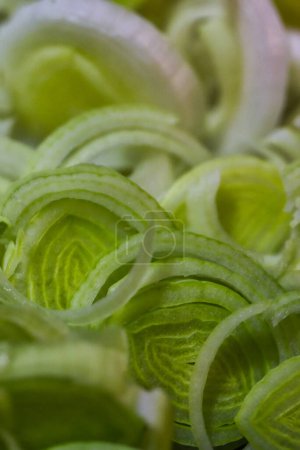 Photo for Fresh green leek slices as background, closeup view - Royalty Free Image