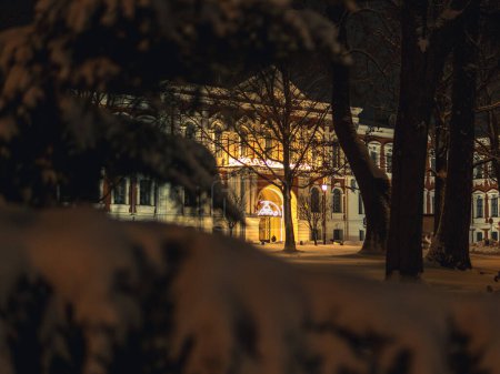 Under the soft glow of evening lights, LLU in Jelgava exudes a tranquil beauty amidst the wintry landscape, inviting students and visitors to embrace the magic of a snowy evening.