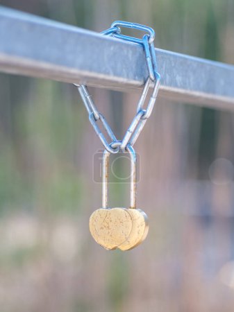 Photo for Adorned with symbols of love, these heart-shaped keylocks adorning Latvia's bridgerail tell stories of enduring romance, bound forever in the heart of the Baltic - Royalty Free Image