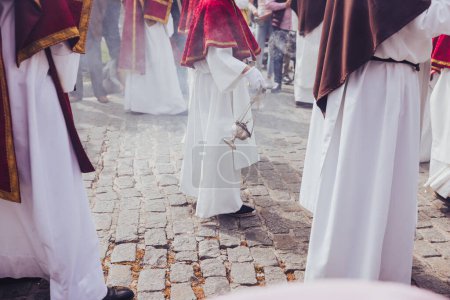 Photo for Holy Week procession with Nazarenes carrying smoldering incense, Holy Week concept. - Royalty Free Image