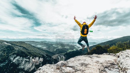Photo for Hiker with backpack celebrating success outdoor. People, success and hiking sport concept - Royalty Free Image
