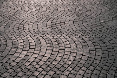 Photo for The monochrome photo captures the hypnotic pattern of cobblestone paving in Budapest, creating a mesmerizing texture that's perfect for backgrounds or design elements. - Royalty Free Image