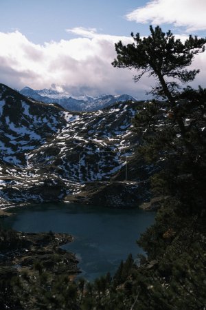 The spectacular panorama of the Pyrenean lakes and mountains captures the essence of Spain's stunning natural landscapes. The contrast between the rugged mountains and the serene lakes is a photographer's dream and a traveler's delight.