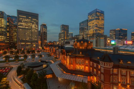 Photo for Tokyo Station is a railway station in the Chiyoda City, Tokyo, Japan. The original station is located in Chiyoda's Marunouchi business district near the Imperial Palace grounds. 19 June 2018 - Royalty Free Image