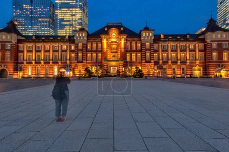 Photo for Tokyo Station is a railway station in the Chiyoda City, Tokyo, Japan. The original station is located in Chiyoda's Marunouchi business district near the Imperial Palace grounds. 19 June 2018 - Royalty Free Image