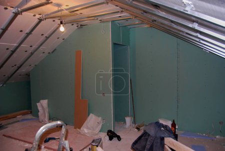 Construction of an attic on the second floor of the house.Insulation of the premises and construction of partitions.