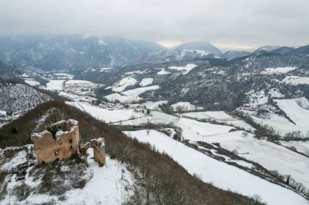 Photo for Aerial view of castle ruins in Marche region in Italy during winter - Royalty Free Image