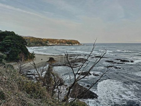 Landscape image of a beach, view from a cliff