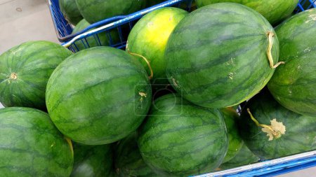 A group of watermelons inside the trolley