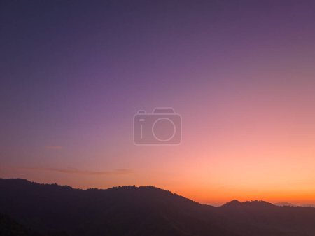 Photo for Aerial view amazing colors in the sky at dawn over the misty sea in the valley. - Royalty Free Image