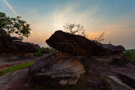 Photo for The morning sun shines on the many large, beautiful rocks that line the cliff.Numerous strangely shaped rocks lined up on the cliffs.A large number of large, beautiful boulders line the cliff. - Royalty Free Image