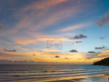 Photo for Drones take pictures of the beautiful sky by the beach in stunning sunset - Royalty Free Image
