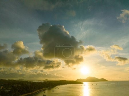 Photo for Aerial top view of golden sky above fishing boats - Royalty Free Image