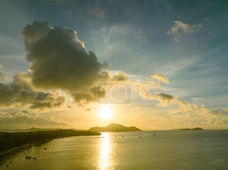 Photo for Aerial top view of golden sky above fishing boats - Royalty Free Image