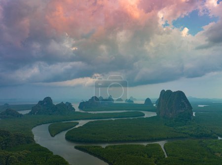 Photo for Aerial view of narrow canal in the mangrove forest at Baan Naingob in Phang Nga, Thailand. The route for sailing from fishing village to the Phang Nga ocean. archipelago in mangrove forest background. - Royalty Free Image