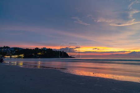 Photo for Amazing golden light through the sunset clouds. Colorful romantic sky and sea shore, Thailand - Royalty Free Image