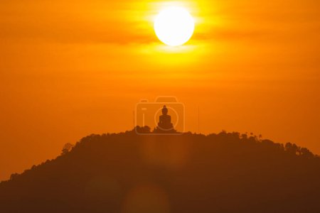 Photo for Dramatic sunset sky and Phuket big Buddha. Phuket, Thailand - Royalty Free Image