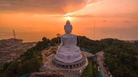 Photo for Aerial view The sun shines through the clouds above the ocean at the Big Buddha - Royalty Free Image