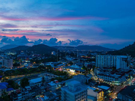 Photo for ..aerial view The lights twinkled along Talang walking street at night..Bright colors along the beach city area at night..beautiful sky in twilight. - Royalty Free Image