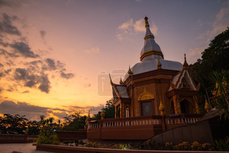 Photo for Sunset behind the beautiful pagoda of Langsan temple in Phuket cityBeautiful sky in the evening at the beautiful pagoda on the mountain top. - Royalty Free Image