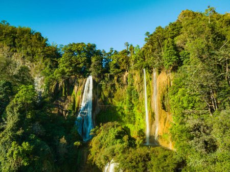 Photo for Aerial View Numerous waterfalls flow from wide, steep cliffs. - Royalty Free Image