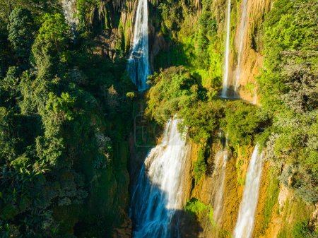 Photo for Aerial View Numerous waterfalls flow from wide, steep cliffs. - Royalty Free Image