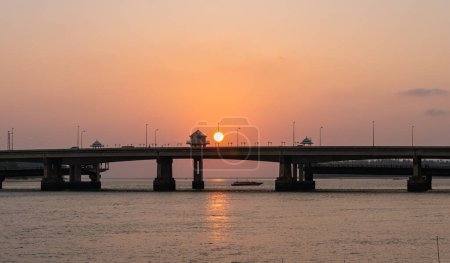 Photo for Scenery sunset at Sarasin bridge. the bridge is the most important in making businesses - Royalty Free Image