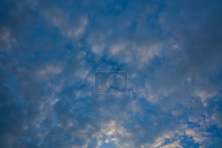 Photo for White clouds in the blue sky The sun shines through. - Royalty Free Image