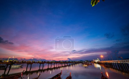 Colorful sunrise at Chalong pier in Thailand