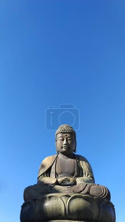 Foto de El Gran Buda de Kamagaya en la ciudad de Kamagaya, Prefectura de Chiba, JapónEn noviembre de 1776, Okuniya Fukuda Bunemon, que vivía en Kamagaya-juku, hizo que Tagawa Shozen, un artesano de fundición en Kanda, Edo, hiciera esta estatua para orar por el reposo de la - Imagen libre de derechos