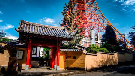 Photo for Shinkoin temple gate and Tokyo Tower.Jodo sect ShinkoinA Jodo sect temple in Minato Ward, Tokyo. It prospered as a separate temple of Zojoji Temple.It was opened in 1393 (Meitoku 4th year) by Seiso.A small hall enshrines Otake Dainichi Nyorai, - Royalty Free Image
