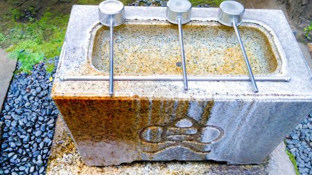 A water purifier on the grounds of a shrine, Kabuto Shrine in Kabutocho, Nihonbashi