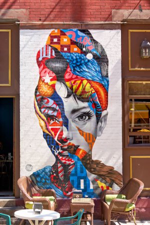 Photo for New York. Manhattan. United States. Cafe at Little Italy. Audrey Hepburn mural - Date: 07 - 09 - 2022 - Royalty Free Image