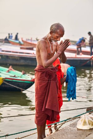 Photo for India. Varanasi Benares Uttar Pradesh. Sacred ablutions on the river Ganges - Date: 03 - 01 - 2023 - Royalty Free Image