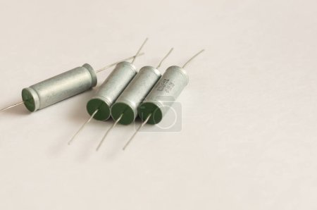 Foto de Isolated capacitor, used in electronic device. Electronic parts concept. - Imagen libre de derechos