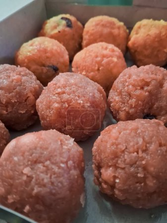 Laddu or laddoo is a sphere-shaped sweet originating from the Indian subcontinent.Laddus are made of flour, fat, and sugar, with other ingredients