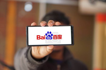 Photo for Logo on smartphone. Baidu, Inc. Baidu is a Chinese multinational technology company specializing in Internet-related services, products, and artificial intelligence,Dhaka,Bangladesh- 11 February 2024. - Royalty Free Image