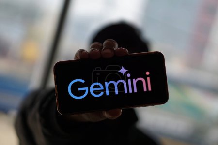 Photo for Google Gemini logo is displayed on a smartphone screen. The tool was launched by Google as its new multimodal artificial intelligence (AI) model,Dhaka,Bangladesh- 02 March 2024. - Royalty Free Image